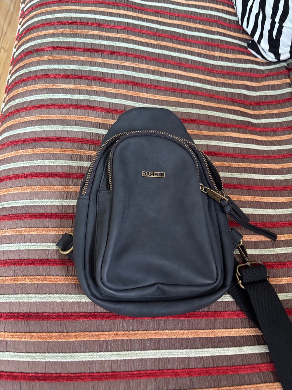 Rosetti Black Leather Sling Belt Bag with Gold Hardware